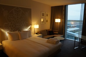 a hotel room with a large bed