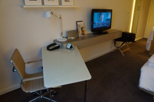 a desk and chair in a room