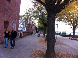 a man walking on a sidewalk