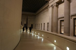 people walking in a hallway