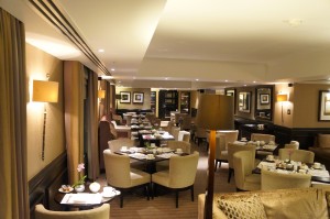 a restaurant with tables and chairs