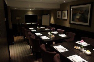 a room with tables and chairs