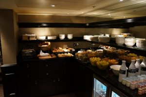 a kitchen with food on shelves