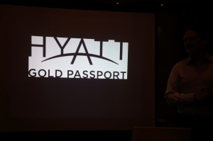 a man standing in front of a screen