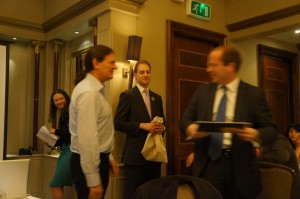 a group of people in suits