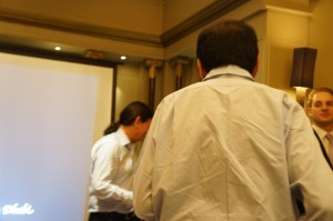 a man and woman standing in a room