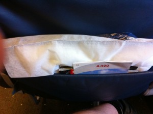 a white bag with tools in it