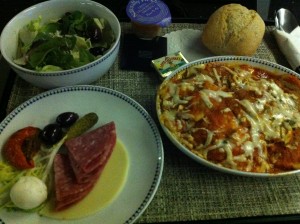 a plate of food and a bread