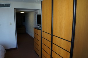 a room with a closet and tv