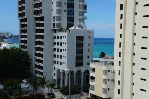 a tall white building with many windows
