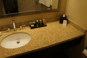 a bathroom sink with a mirror