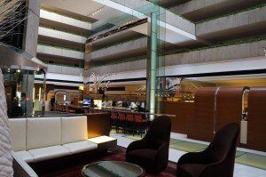 a room with a large wall and a large window