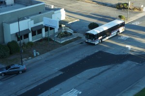 a bus and a car on the road