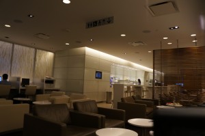 a room with a few chairs and tables
