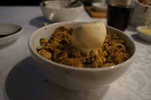 a bowl of food with a white substance