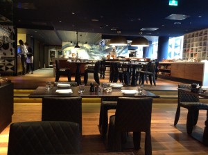 a restaurant with tables and chairs