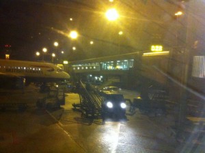 a plane at an airport at night