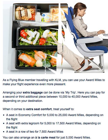 a woman sitting in a chair with food in a tray