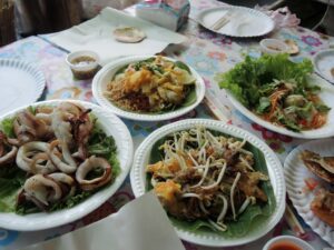 a table full of plates of food