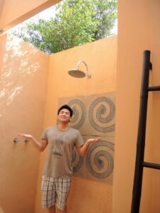 a man standing in a shower