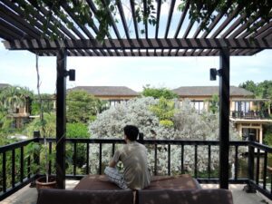 a man sitting on a patio