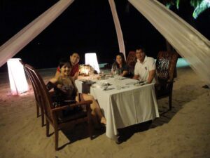 a group of people sitting at a table
