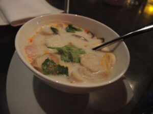 a bowl of soup with a spoon
