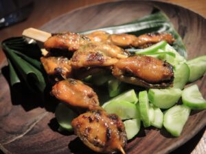 a plate of food on a wooden surface