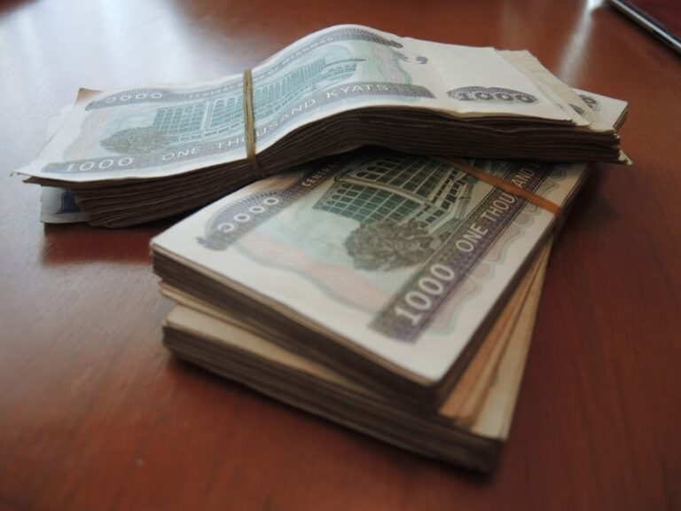 a stack of money on a table