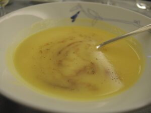 a bowl of soup with a spoon