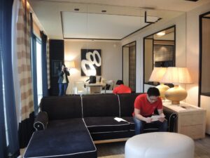a man sitting on a couch in a room
