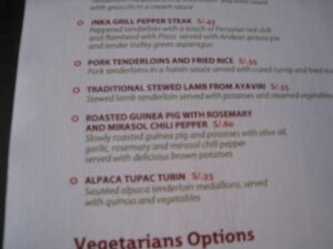 a menu with red and green text