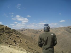 a man standing in a valley