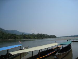 long shot of boats on a river