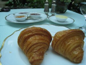 a plate of croissants on a table