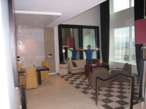 a couple of people standing in a living room