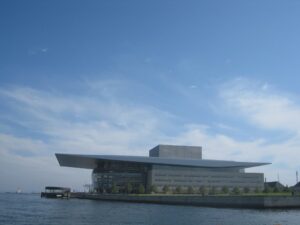 a building next to water