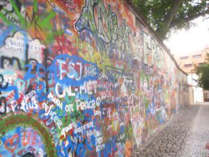 a wall covered in graffiti