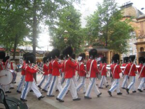 a group of people marching in uniform