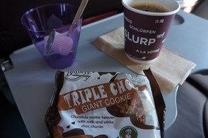a bag of cookies and a cup of coffee
