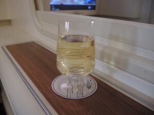 a glass of wine on a table