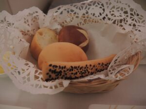 a basket of bread and rolls
