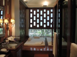 a room with a bed and a window