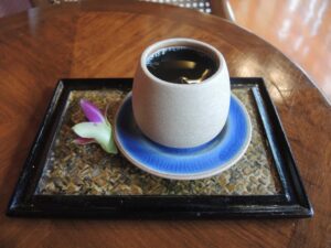 a cup of coffee on a plate