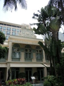 a building with palm trees
