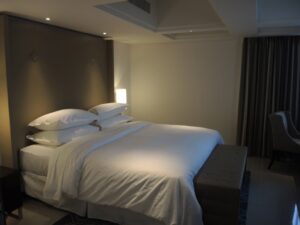 a bed with pillows on it