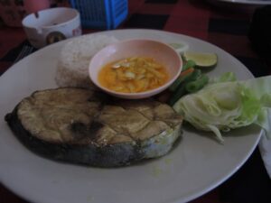a plate of food with a sauce on it