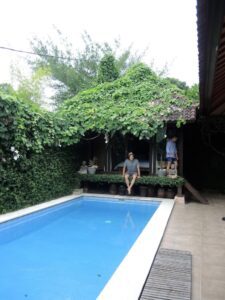 a person sitting in a pool