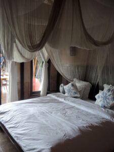 a bed with a canopy over it