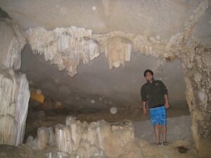 a man standing in a cave